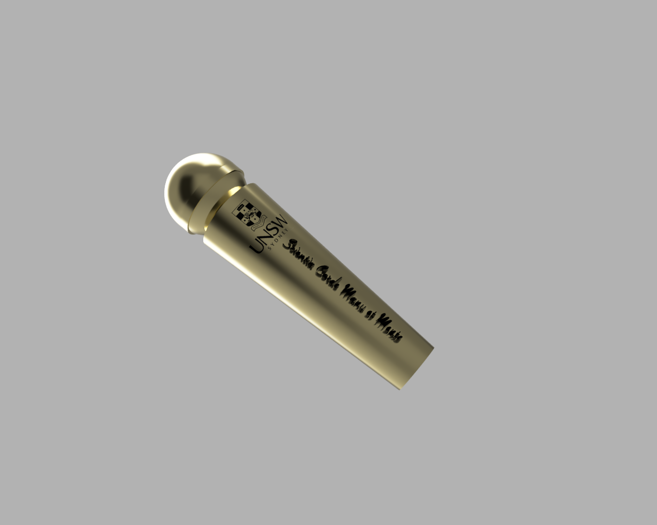 A gold-plated Hitachi Wand with the UNSW Sydney logo printed on it. The wand is engraved with UNSW's motto Scientia Corde Manu Et Mente. Credits: Anon